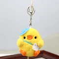 Cute yellow plush chick keychain with blue hat and tiny white bird bag detail - Blue Hat With Lobster Clasp