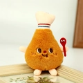 Nahaufnahme vom Plüsch-Hähnchenschenkel Anhänger mit Stickerei und kleinem Löffel - 8-13cm / Hähnchenkeule