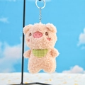 Simpatico ciondolo maialino di peluche rosa con bavaglino a quadretti verdi - Maialino