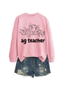 Detailed view of pink Ag Teacher sweatshirt featuring cute farm animal graphic and denim shorts - S / Pink Sweatshirt (Black Text Pattern)