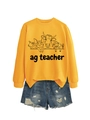 Detail view of yellow sweatshirt with ag teacher farm animal graphics and denim shorts - S / Yellow Sweatshirt (Black Text Pattern)