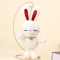 Cute white plush bunny keychain with closed eyes, red inner ears and a golden bell - White