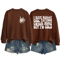 Brown crewneck sweatshirt with 'COOL TATTOOS' bone hand print and slogan on back detail - S / Tops / Coffee (White Print)