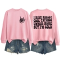 Pink sweatshirt detail showing cool tattoos back print and distressed denim shorts - S / Tops / Pink (Black Print)