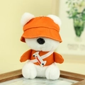 Cute white plush puppy keychain wearing an orange bucket hat and shirt with a bone bag - Orange / About 12cm