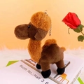 Detail of cute brown plush camel keychain with silver bead chain on white prop book - Small / Dark Brown