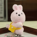Pink plush bunny keychain toy with a small yellow felt bag and pearl detail decoration - Rabbit