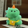 Cute green plush dinosaur keychain with a small yellow crossbody bag accessory - Dinosaur