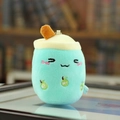 Mint green plush milk tea cup keychain featuring apple embroidery and orange straw - Blue