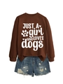 Detail of a brown sweatshirt with JUST A girl WHO LOVES dogs text and denim shorts - Coffee (White Font)