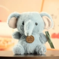 Light blue long-haired elephant plush toy with soft texture and wooden brand tag - Elephant / 15-18cm Ornament Style
