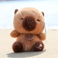 Cute brown capybara plush toy with heart embroidery on beach background - Capybara / 15-18cm Ornament Style