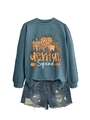 Detailed close-up of Dental Squad graphic sweatshirt with pumpkin tooth patterns and denim shorts - S / Blue (White Print)