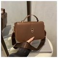 Deep brown retro leather shoulder bag with a wide strap and gold shield buckle - Brown