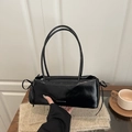 Glossy black patent leather bow baguette bag with stylish shoulder strap and logo - Black