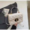 Detail of cream quilted crossbody bag with gold twist lock on grey blazer fabric - Off-white