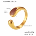 Macro detail of gold-plated stainless steel ring featuring red oil drip teardrop inlay - Size 7 / Enamel Glaze Open Style (A584) / Brown