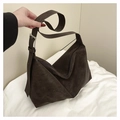Detail of dark brown matte leather shoulder bag featuring adjustable strap and silver buckle - Brown