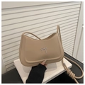 Detail of beige leather crossbody bag with silver metal bow and slim knotted strap - Khaki