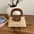 Mini borsa a tracolla vintage beige a pois con manico marrone e chiusura a girello oro - Cachi