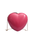 Glänzende herzförmige Mini-Umhängetasche in Rosarot mit goldener Kette - Fuchsia