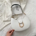 White faux crocodile leather saddle bag with gold D-buckle and pearl strap accents - White