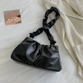 Minimalist black cloud shoulder bag with textured ruched design and matching strap - Black