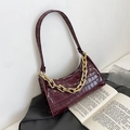 Chic burgundy crocodile embossed hobo bag with a decorative gold chunky chain strap - Purple