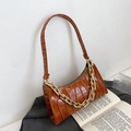 Brown crocodile texture shoulder bag featuring a chunky gold chain and glossy PU finish - Brown
