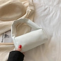 Elegante borsa a mano cilindrica in morbida pelle bianca con manico minimalista - Bianco