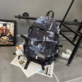 Sac à dos scolaire bleu marine à motif journal avec breloque canard en peluche chic - Noir