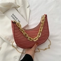 Pink crocodile pattern crescent bag with bold gold chain and crossbody strap - Pink