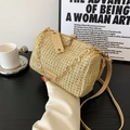 Gewebte Zylindertasche in Beige aus Stroh mit braunem Lederbesatz und goldener Blumenkette - Khaki