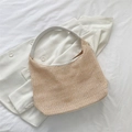 Woven straw hobo bag in beige featuring a white leather shoulder strap for summer beach - White