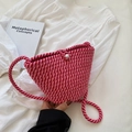 Bolso saco tejido a mano con patrón en espiral rojo y rosa y elegante cierre de perla - Rosa