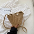 Handmade woven bucket bag in beige with pearl clasp and slim crossbody strap - Khaki
