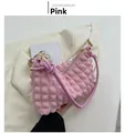 Detail of pink bubble bag showing waffle pleated texture and knot with gold ring - Pink