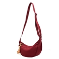 Dark red nylon crescent bag with adjustable shoulder strap and cute bird plush pendant - Red