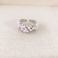 Luxurious silver ring with multi-pearl clusters on rustic linen background - White Gold