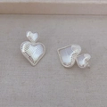 Textured double heart stud earrings in silver finish with vintage milgrain edges - Silver