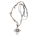 Long woven necklace with hollow branch flower pendant and purple bead accents on white background - Silver