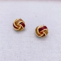 Knot earrings in gold plating with burgundy and yellow enamel on white texture - Red-brown Mix