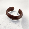 Vintage brown genuine leather cuff bracelet with yellow stitching on stone pedestal - Narrow / Brown