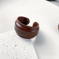 Detail of dark brown leather wide cuff bracelet with stitching on white stone block - Width / Brown