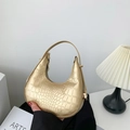 Golden hobo bag with crocodile pattern and metallic finish in a crescent shape - Gold