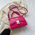 Magenta crocodile pattern crossbody bag with woven handle and gold clasp detail - Rose Red