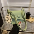 Light green vintage saddle bag with cute bear charm and adjustable shoulder strap - Green