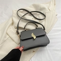 Dark gray leather crossbody bag with golden flame clasp and top handle for women - Dark Gray