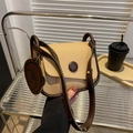Retro khaki and brown contrast leather saddle bag with a cute bear charm accessory - Khaki