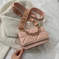 Pink quilted crossbody square bag with wide fabric strap and golden chain detail - Pink
